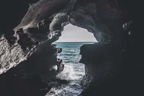 The iconic Hercules Caves near Tangier, Morocco, with their unique opening resembling the shape of Africa.